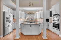 kitchen with huge island for entertaining and gas stove