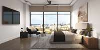 Spacious 2- and 3-bedroom floor plans featuring high-end finishes like Fisher & Paykel paneled appliances, quartz countertops with waterfall edges, solid core wood doors, and zero-entry showers in the primary bathrooms.