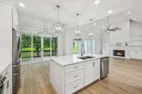 All matching quartz counter tops throughout the home. Dishwasher has Wi-Fi capability! What a beautiful view.