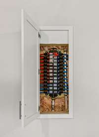 Manifold giving specific access to each water line. Hot water comes much much quicker this way!