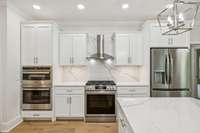 All new Stainless Steel appliances. Gas oven has convection and airfry modes! There is an additional wall oven and microwave combo.