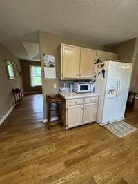 The other side of the kitchen with more cabinets!