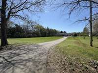 View of paved driveway from Henley Dr.