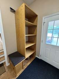 Custom built oak cabinet in the foyer area.
