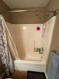 Hall bath shower/tub combination.
