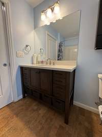 Easy to clean under the vanity cabinet with these modern raised legs