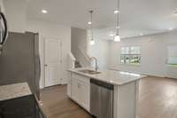 Spacious Island with Pendant Lights