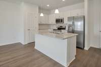House comes fit with Refrigerator, Microwave, Dishwasher, and Stove.