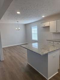 Photo of different home but same floor plan. Finishes will vary.