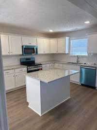 Photo of different home but same floor plan. Finishes will vary.