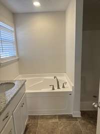 Photo of different home but same floor plan. Finishes will vary.