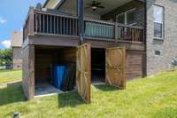 Extra sealed storage with concrete pads & cedar planking.