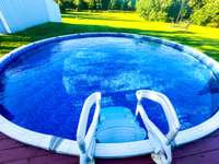 Cool Off On Those Summer Days In This Low Maintenance Salt Water Pool. New Liner And Pump!