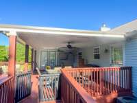 Covered Porch!  Turn The Fans On And Enjoy The Game While Lighting The Grill!