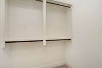 All closets feature wood shelving.