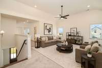 **Virtually staged example** of the upstairs loft style bonus room