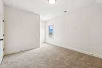 Bedroom 5 is located upstairs