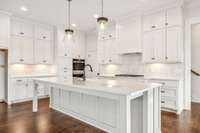 Home features stunning kitchen with oversized island!