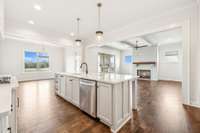 Kitchen opens to dining room and living room