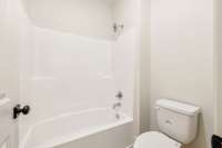 Bathroom 3 features tub/shower combo