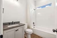 Second full bathroom is located downstairs
