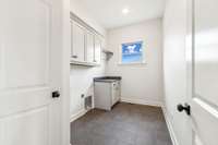Laundry room with soft-close cabinets