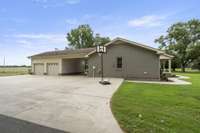 Approximately 3400 sf one level brick and vinyl siding on the 2 car attached garage with breezeway situated on 6.13 acres and fenced backyard area