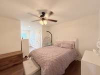 Bedroom 2 has hardwood flooring and ceiling fan with approximately 60sf study/hobby area; Room has double closets; Jack & Jill Bath between Bedroom 2 & 3