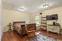 Bedroom 4 on opposite end of home;  Perfect guest bedroom off from Mud Room/Drop Zone; Hardwood flooring with double closets