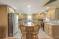 Custom built in cabinets with crown molding is made for family gatherings