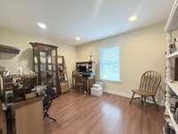 Flex/Office/Hobby space behind the See Thur Fireplace overlooking backyard; Recessed lighting