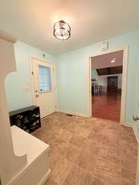 Great space for Drop zone/Mud Room from the covered breezeway & 2 car garage