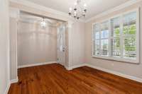 Another view of the formal dining room and foyer