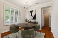 Dining room overlooking front of home. . . Virtually Staged