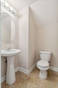 Guest half bathroom downstairs