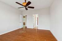 Another view of the primary bedroom on the main level