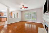 Wonderful family room with lots of windows.  Windows with plantation shutters!