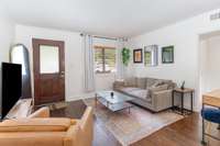 Living room and hallway to bedroom, bath, and washer/dryer closet!