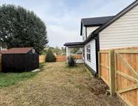 Rear of Home showing Outdoor Storage