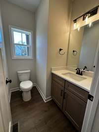 Half bath off of the foyer