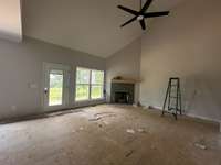 Living room open to the dining and kitchen