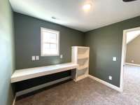Check out this office located off the Bonus room.    A rare treat in this new home.  Perfect for working at home or home school projects.