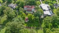An aerial view...you can see the back of the property and the new fence that surrounds the sides and rear of the property...