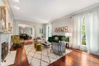 The living room fireplace, one of five throughout, was refurbished with gas logs and automatic starter....