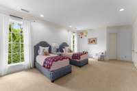 This children's room is so fun and playful....does anyone notice the size of this room?  Not seen in the picture is a wall of double door closets for plenty of storage...