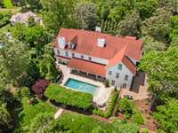 This lush property has been updated last year with new landscaping and full yard irrigation...
