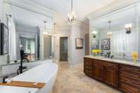 The exquisite spa-like retreat welcomes you in...includes a steam shower, his and her water closets and two separate closets...