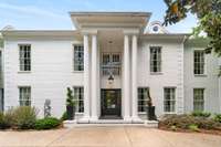 Lovingly referred to as "The Manor" by the current owner, this home sits on almost 2 lush acres....