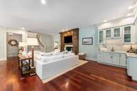 Plenty of space to cozy up to the fireplace....and right next to the wet bar for refreshments...