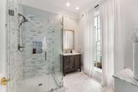 This serene marble bath was updated in 2022...